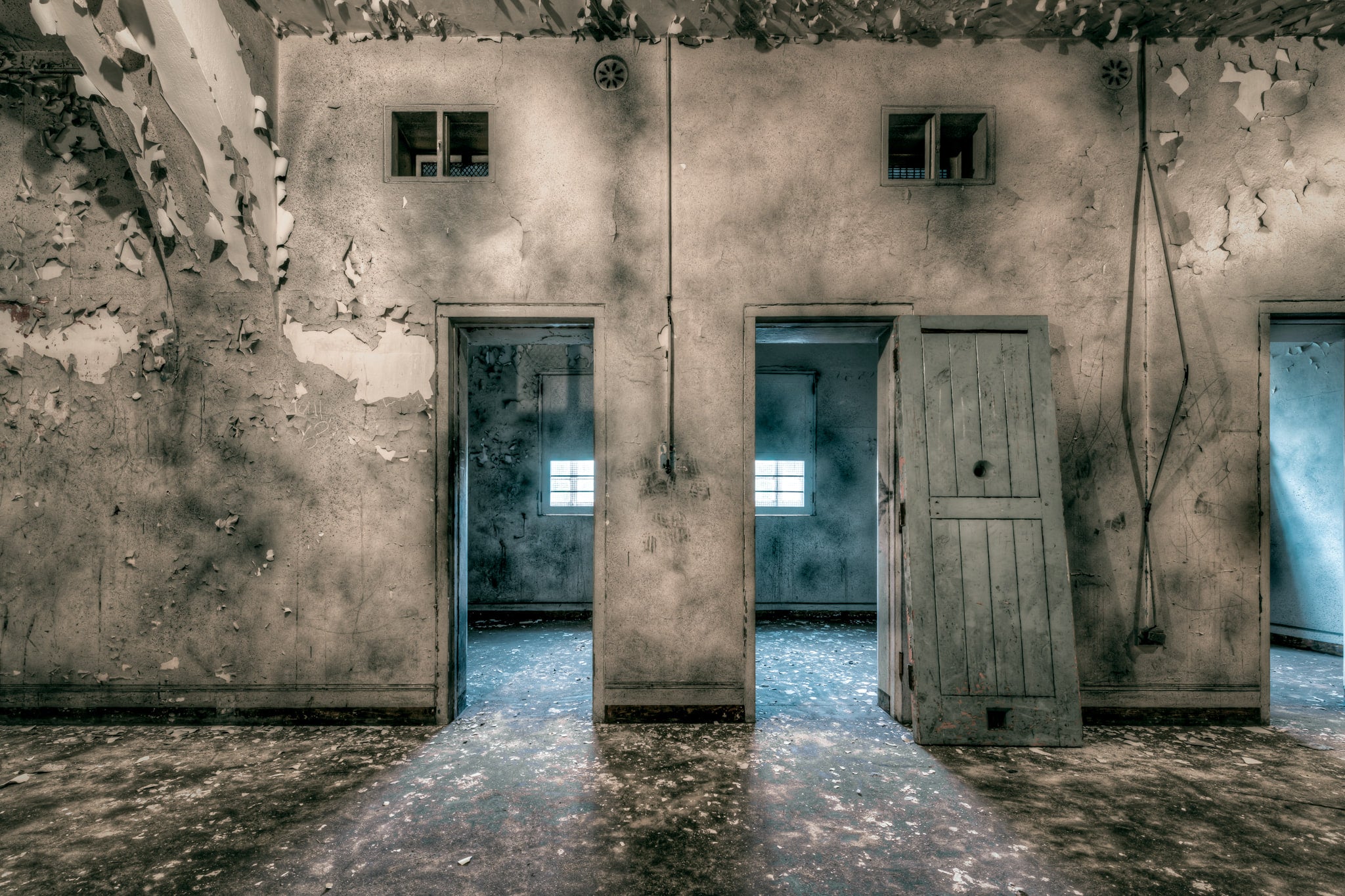 Cell Doors at Female Ward 9 & 10, open doors showing inside the tiny patient rooms of the Female Ward 9 and 10 of Callan.