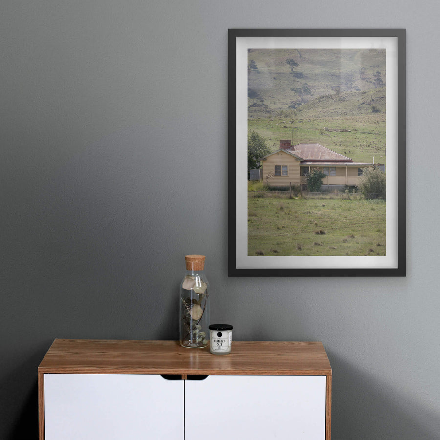 Boco Homestead at A Place to Call Home, an abandoned weatherboard farmstesd perched on a hillside.