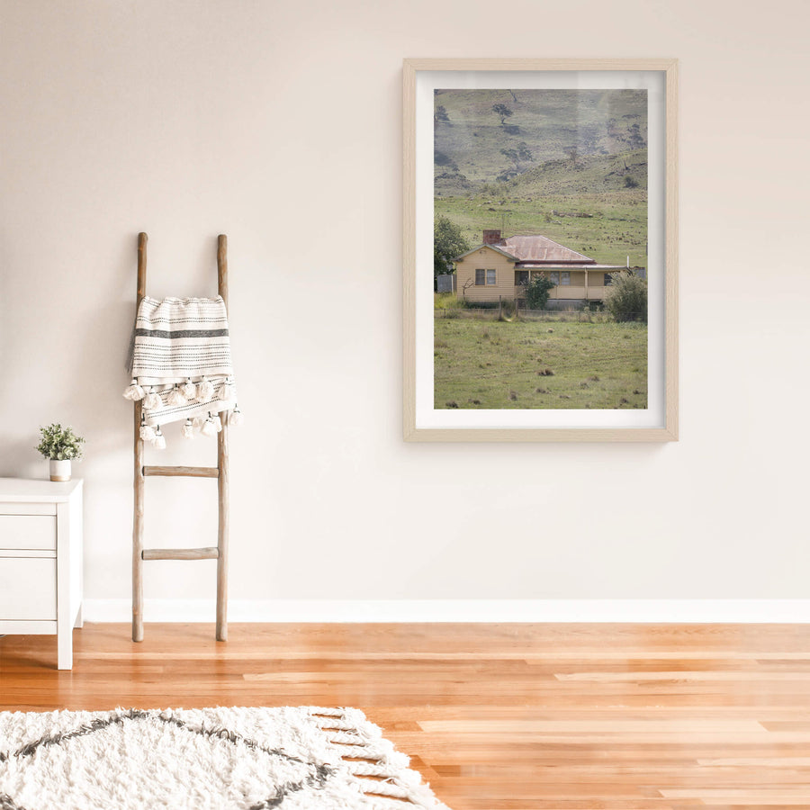 Boco Homestead at A Place to Call Home, an abandoned weatherboard farmstesd perched on a hillside.