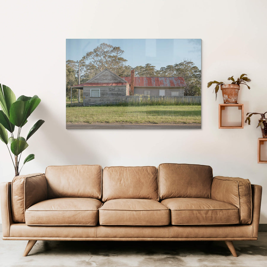 Cathcart Corner at A Place to Call Home, an old, red-roofed timber weatherboard house on the corner of a Cathcart Street.