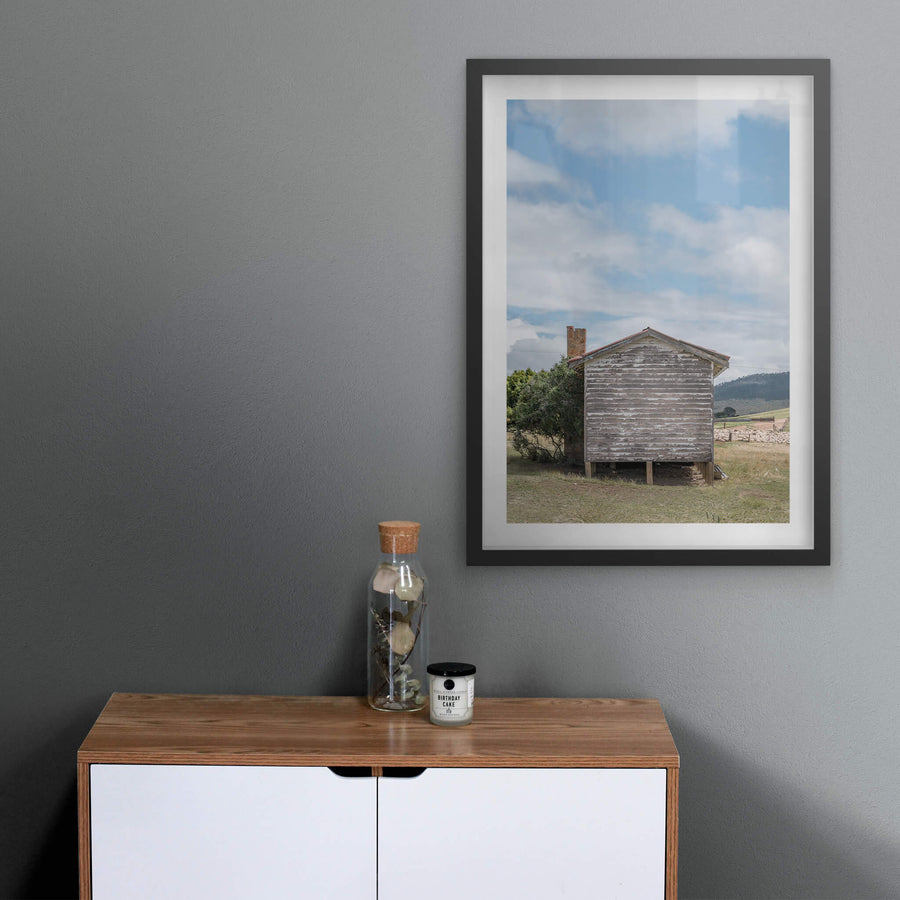 Delegate Shearers Rear at A Place to Call Home, a weatherboard cottage sits raised on timber stumps in dry pastoral land.