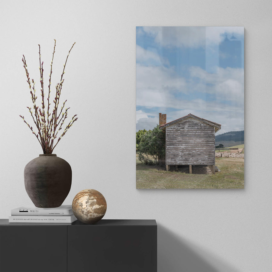Delegate Shearers Rear at A Place to Call Home, a weatherboard cottage sits raised on timber stumps in dry pastoral land.
