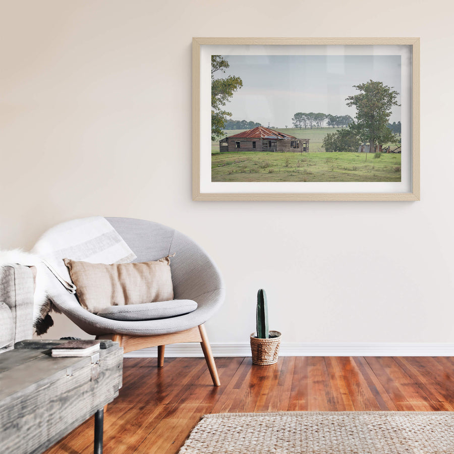 Hunter Homestead at A Place to Call Home, a weatherboard farmhouse sits low in open paddock, its hip roof a patchwork.