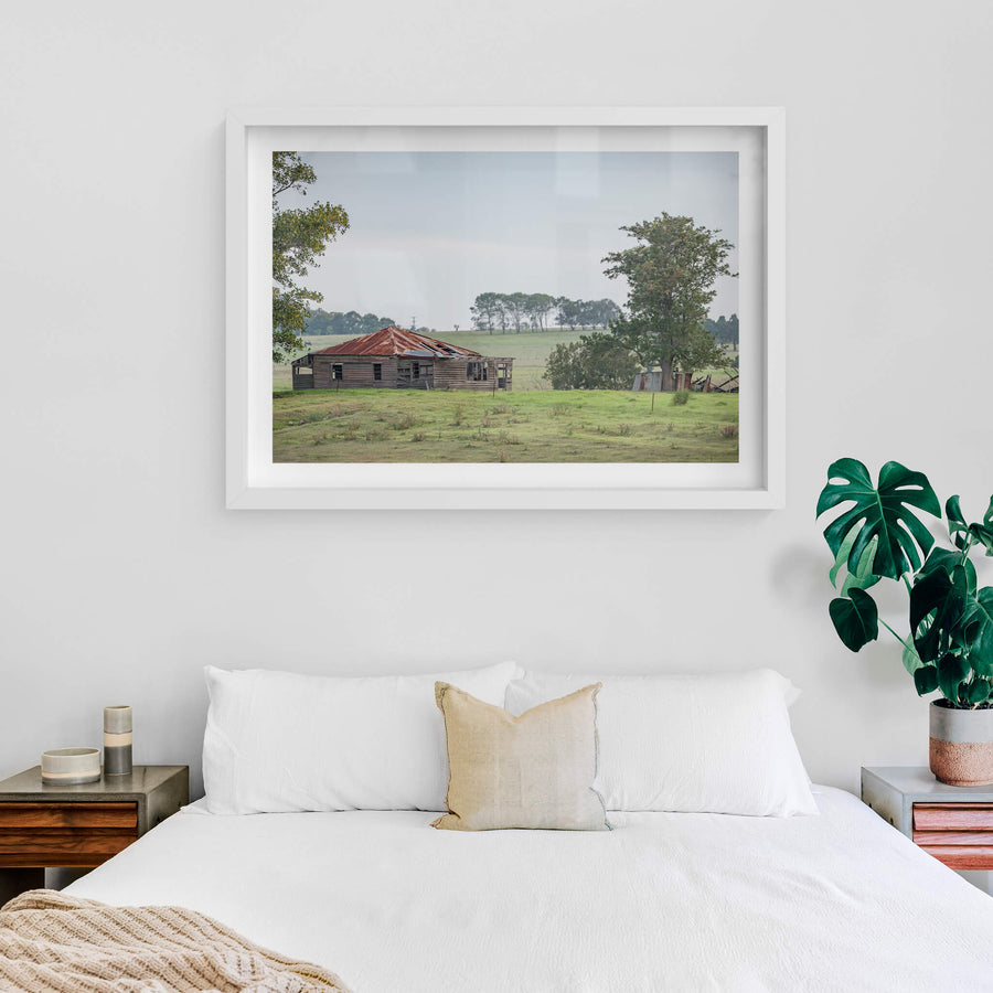 Hunter Homestead at A Place to Call Home, a weatherboard farmhouse sits low in open paddock, its hip roof a patchwork.