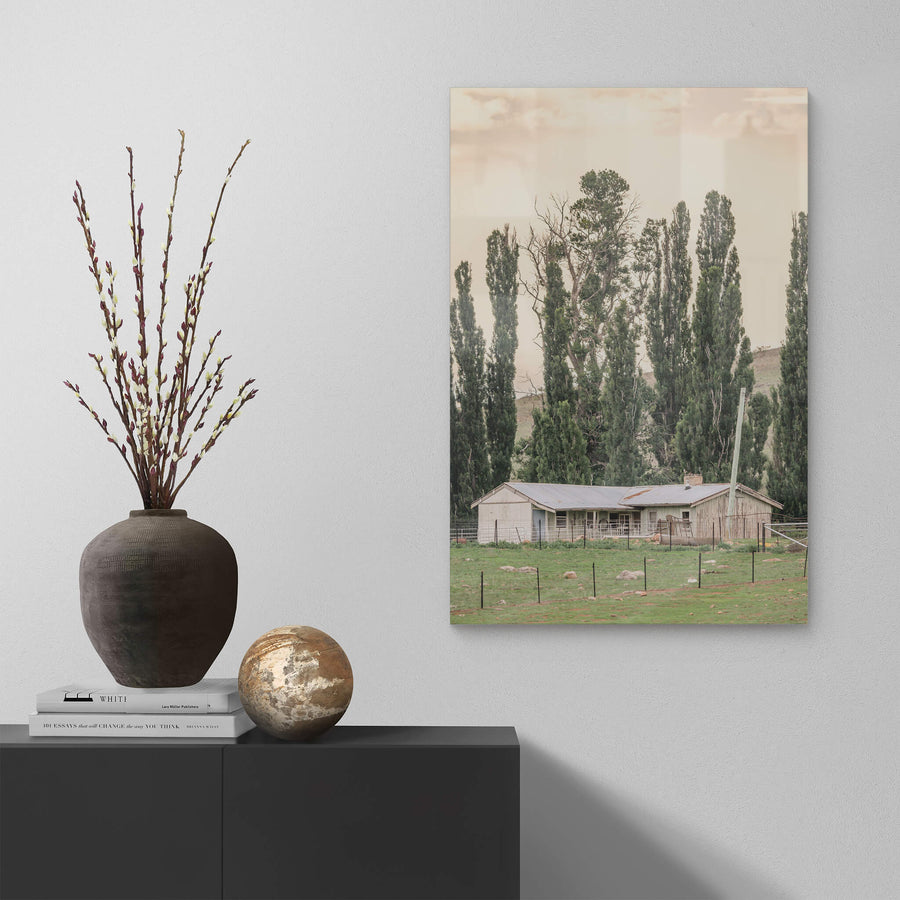 Snowy River Shearers Quarters at A Place to Call Home, a low timber and corrugated iron shearing shed sits behind steel.