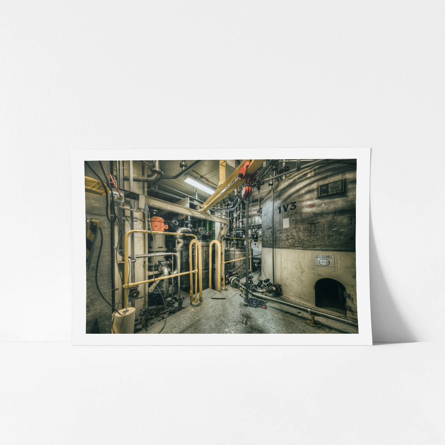Basement D20 Plantroom at ANSTO HIFAR, heavy water storage vessel 1V3 fills the right side of the frame, its curved steel.