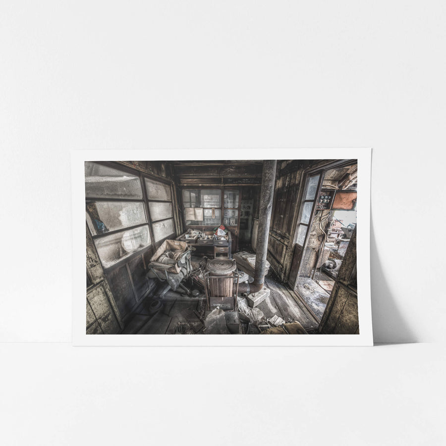 Managers Office at Ashio Copper Mine, a small timber-framed office crammed with debris.