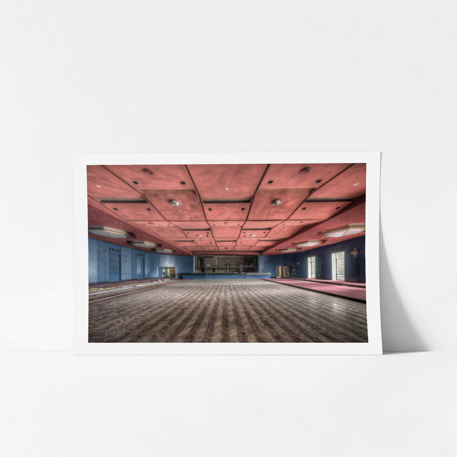 Auditorium at Bankstown RSL, a vast ballroom stretches toward a darkened stage at the far wall.