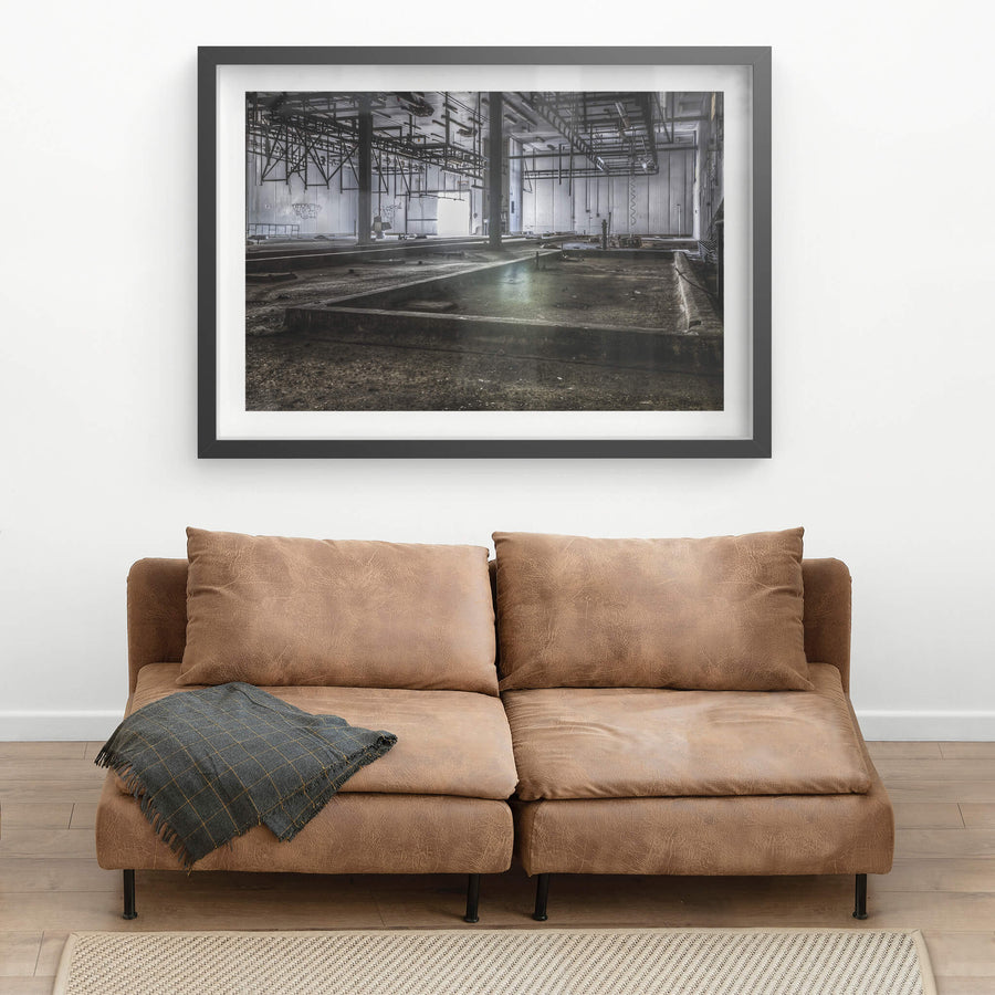 Kill Floor at Blayney Abattoir, steel columns rise from a concrete floor divided into shallow bays and drainage channels.