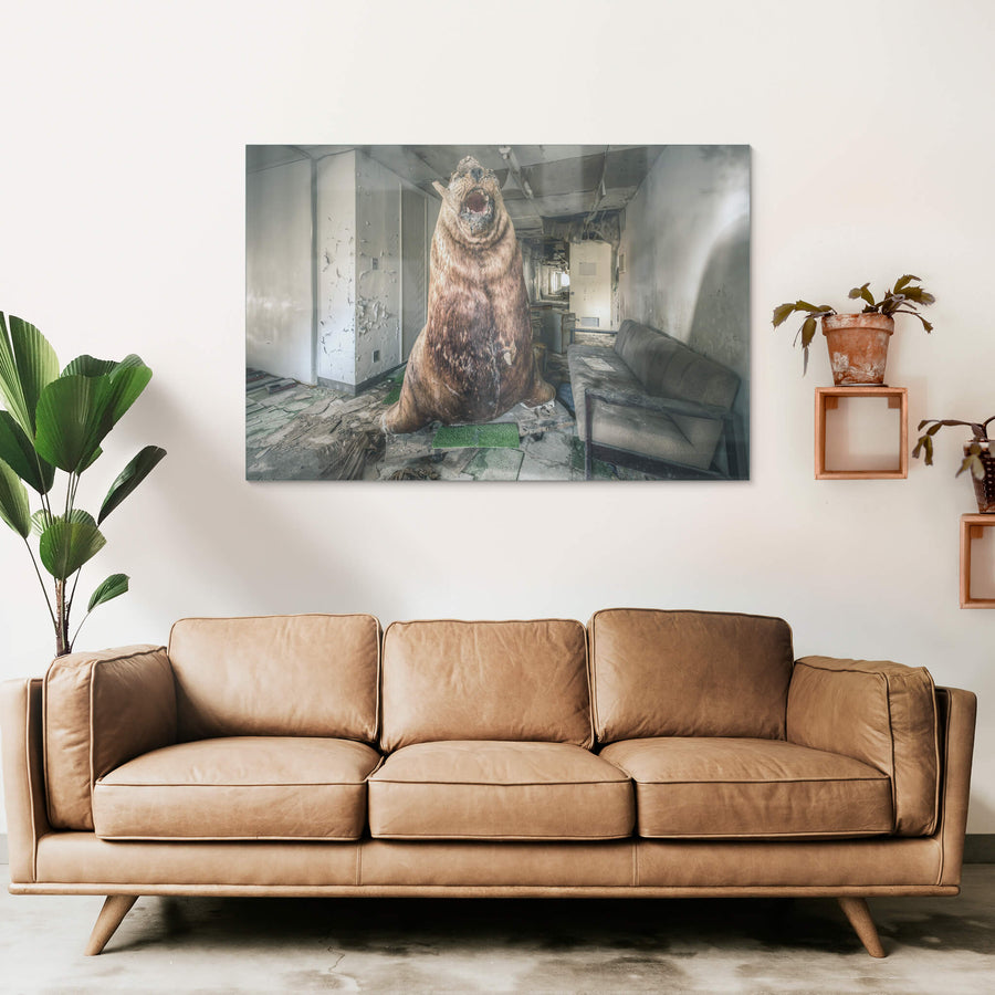 Seal Of Approval at Family School Fureai, a taxidermied brown bear sits upright on a small rectangle of artificial turf.