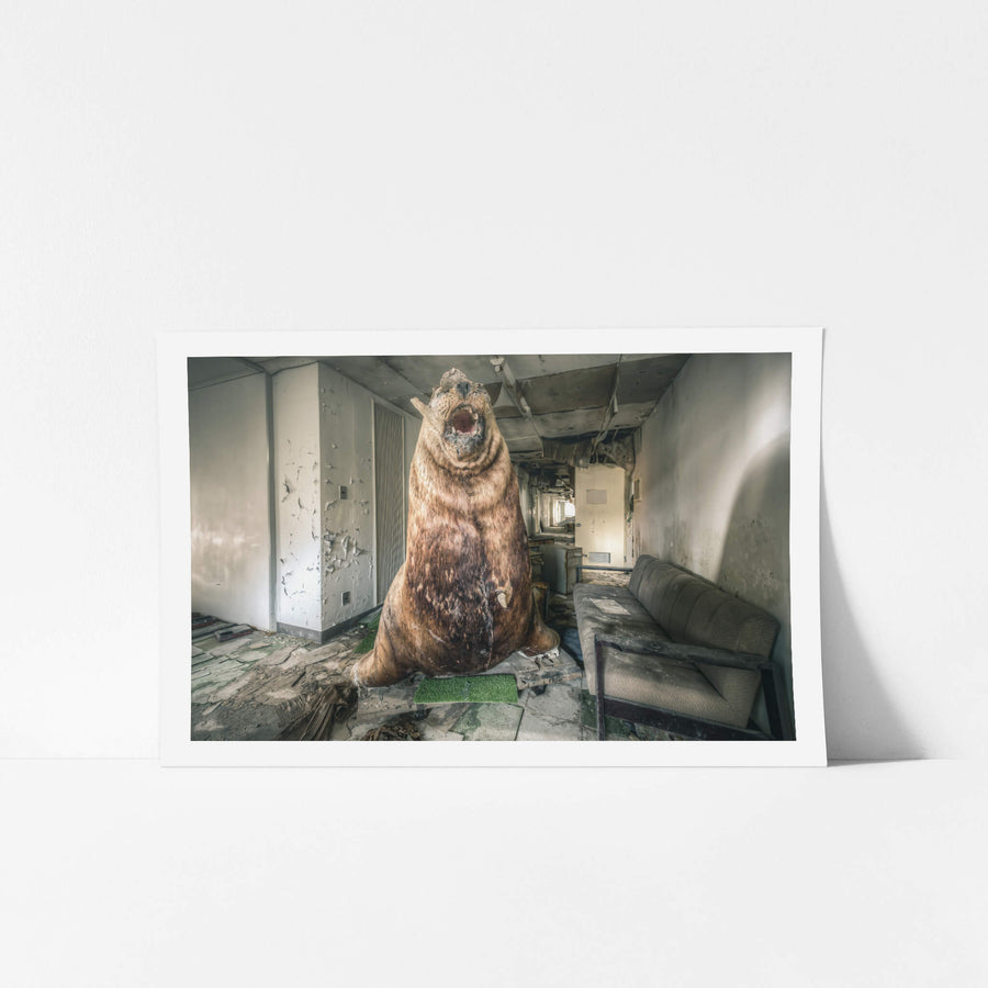 Seal Of Approval at Family School Fureai, a taxidermied brown bear sits upright on a small rectangle of artificial turf.