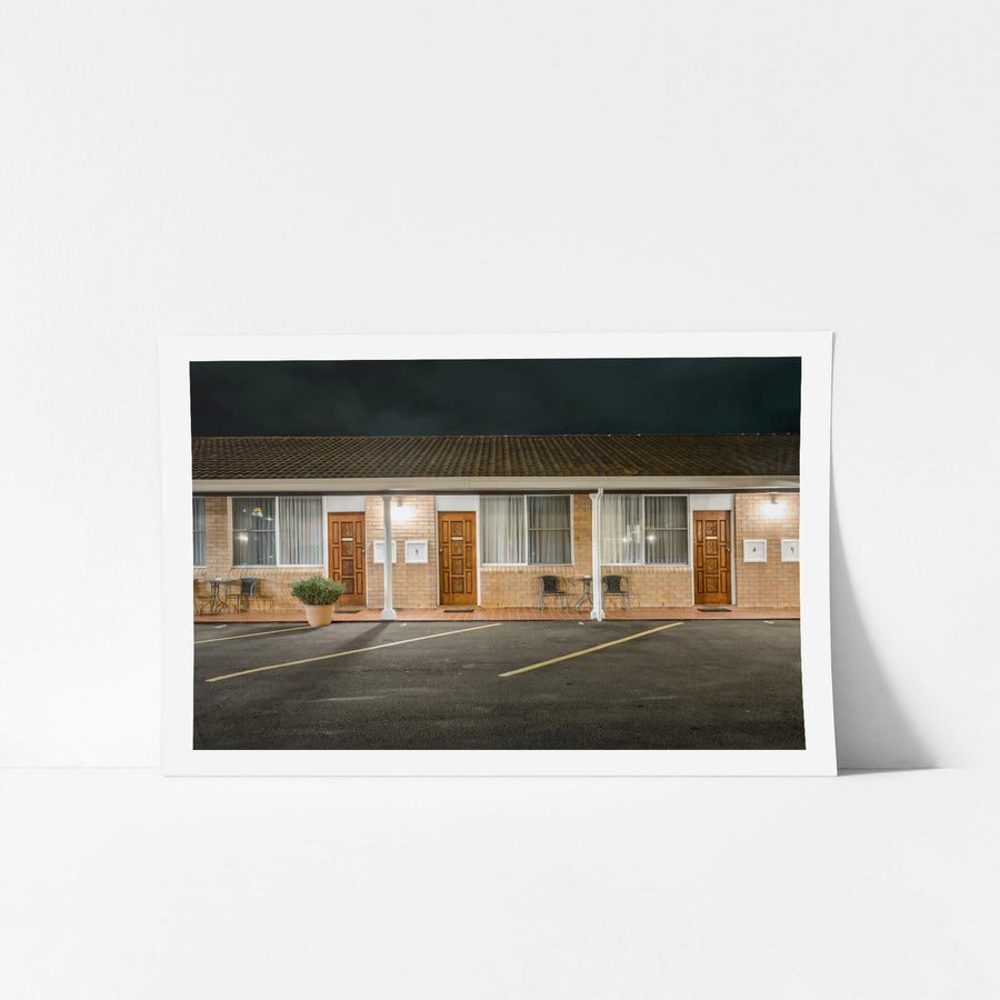 Windmill Motel at Hotel Motel 101, cream brick facade.
