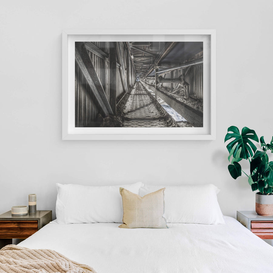 Cement Mill Conveyor at Kandos Cement Works, a narrow corridor stretches deep between corrugated iron walls.