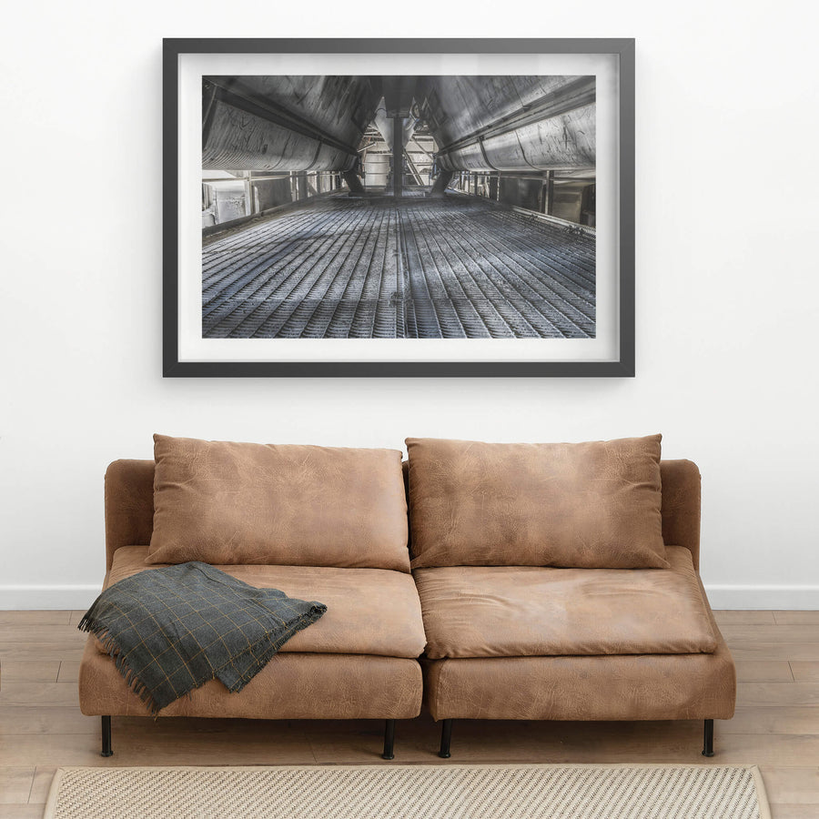 Dust Screws at Kandos Cement Works, two massive screw conveyors run parallel overhead, their steel housings converging.