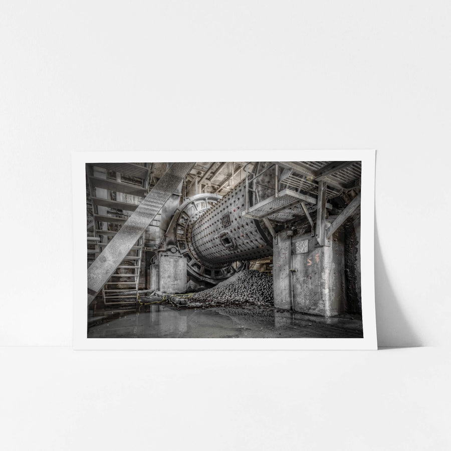 Number Six Raw Mill at Kandos Cement Works, a ball mill sits heavy in the half-light, its riveted steel drum tilted toward.