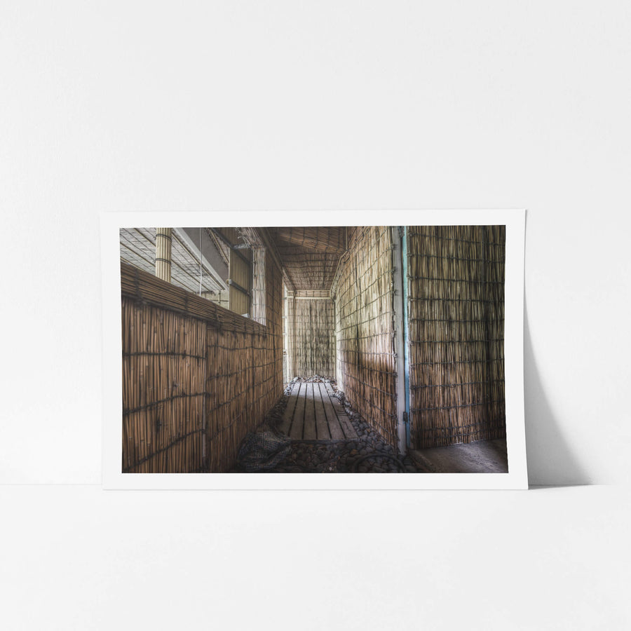 Thatched Walkway at Kinugawa Kan, bamboo reed panels line both walls of a narrow corridor inside Kinugawa Kan.
