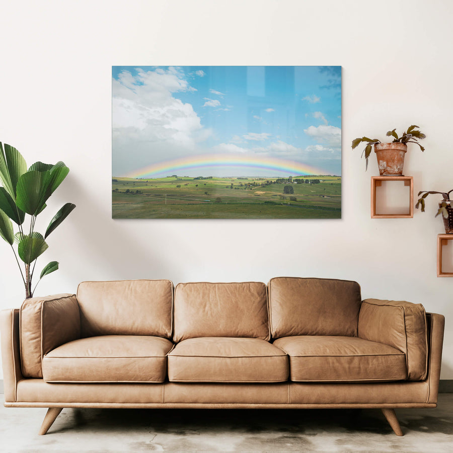 Blayney Rainbow at Landscapes, a rainbow stretching across farmland in the Central West New South Wales township of Blayney.