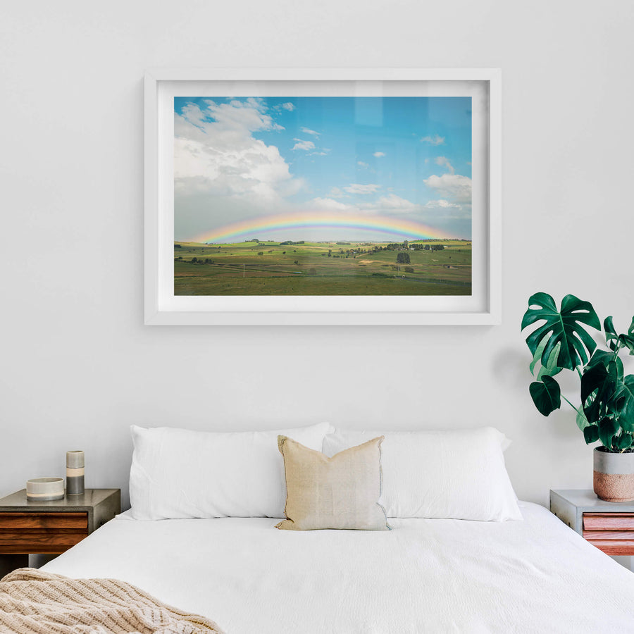 Blayney Rainbow at Landscapes, a rainbow stretching across farmland in the Central West New South Wales township of Blayney.