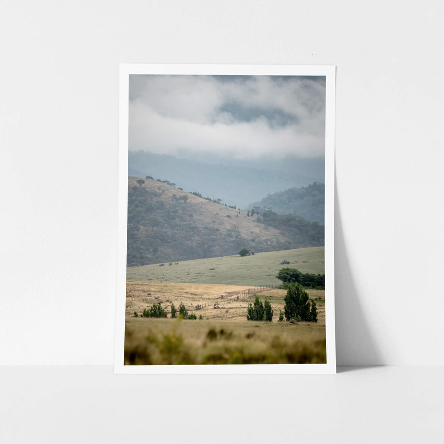 Blue Morning Ranges at Landscapes, a cloudy morning over a farm off the Monaro Highway.