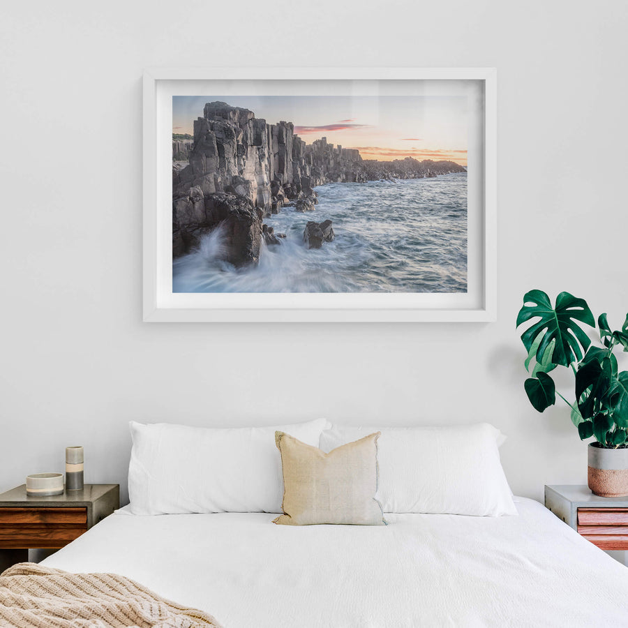 Bombo Quarry at Landscapes, waves crashing against the rocks at sunrise.