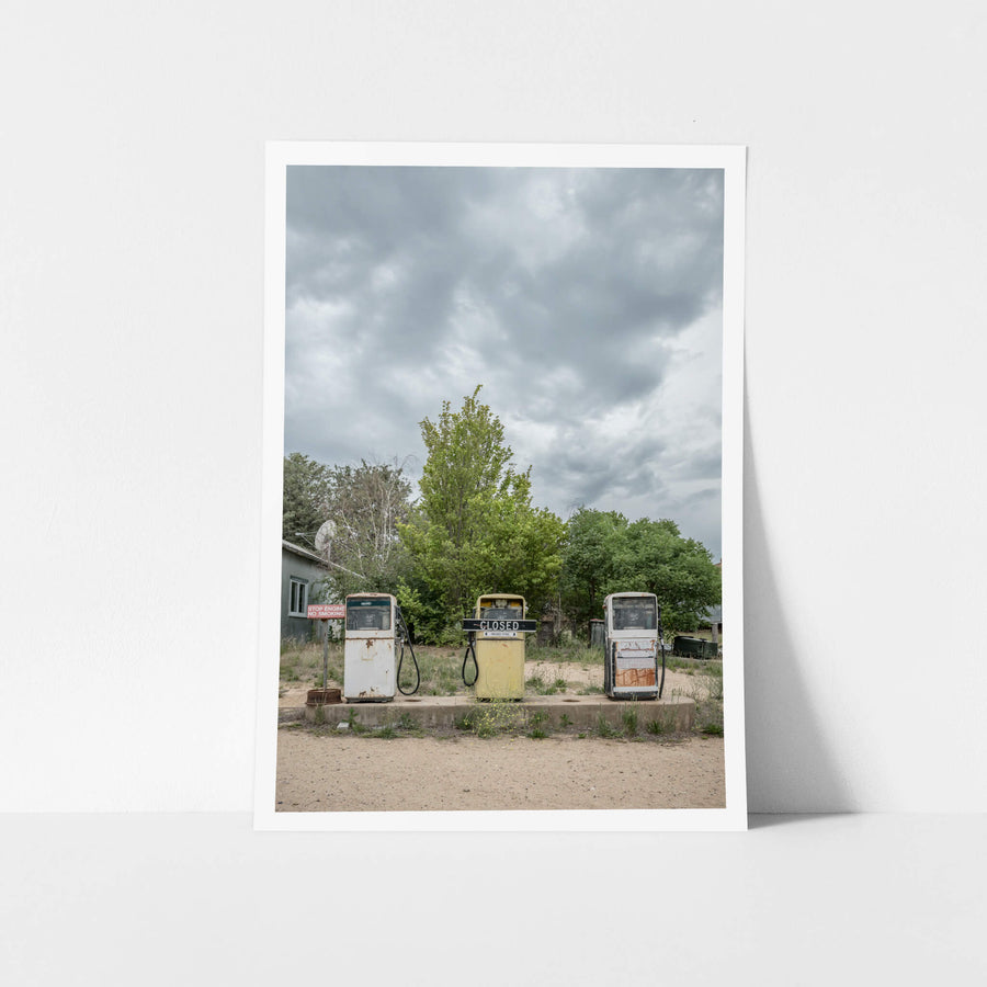 Dalgety Petrol Station at Landscapes, three fuel pumps stand on a concrete island at Dalgety's roadside service station.