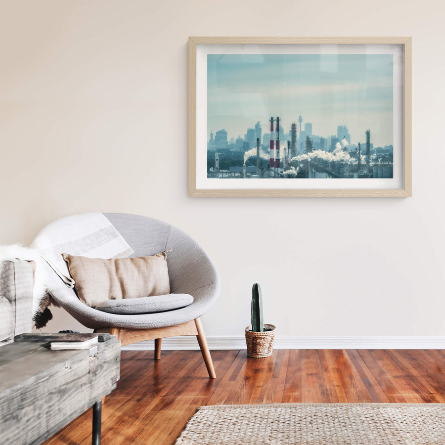Twin Cities at Landscapes, an industrial city in front of a hazy capital city.