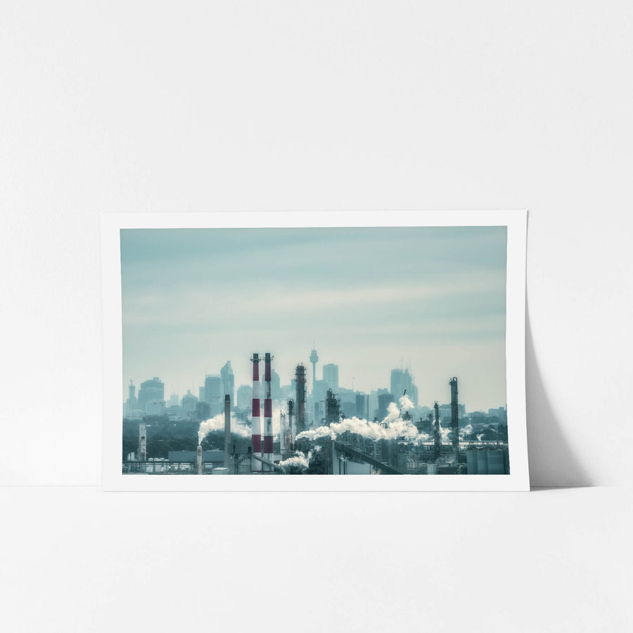 Twin Cities at Landscapes, an industrial city in front of a hazy capital city.