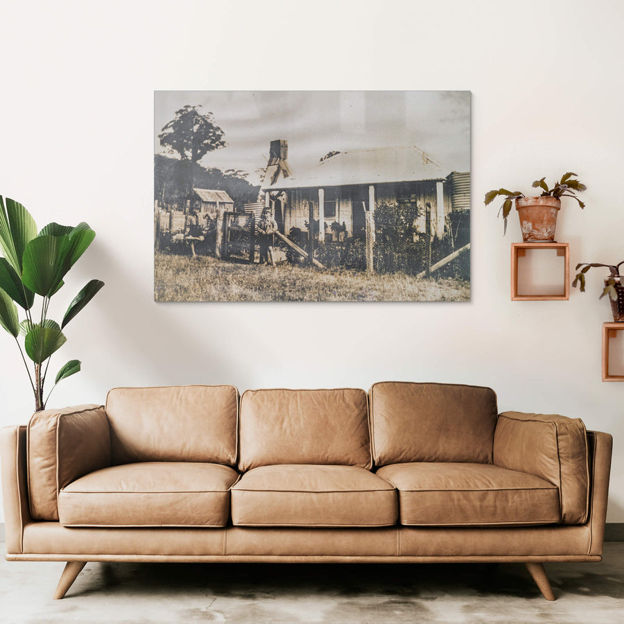 History at Leichhardt House, a sepia-toned archival photograph sits within the frame.
