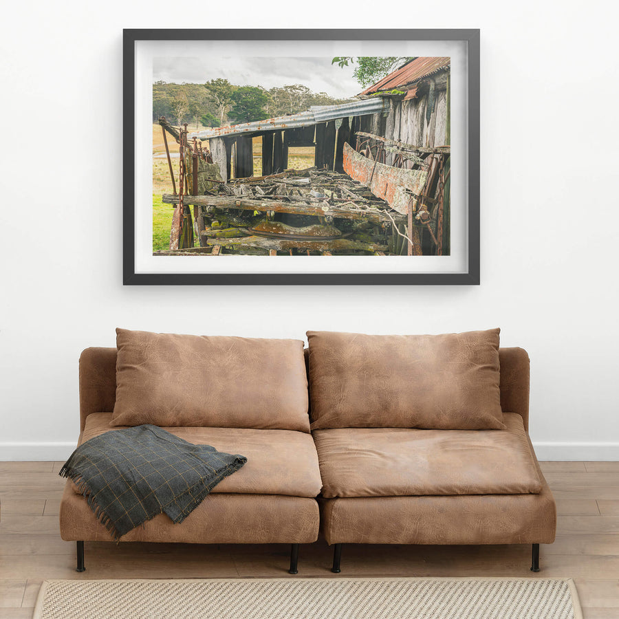 Wagon Tray at Leichhardt House, a horse-drawn wagon sits collapsed beside a slab timber shed.