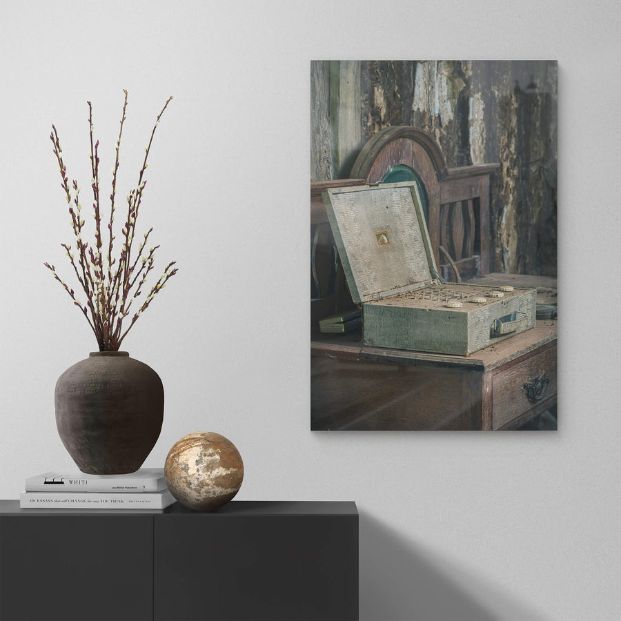 Wireless at Leichhardt House, a portable valve radio sits open on a dark timber dresser.