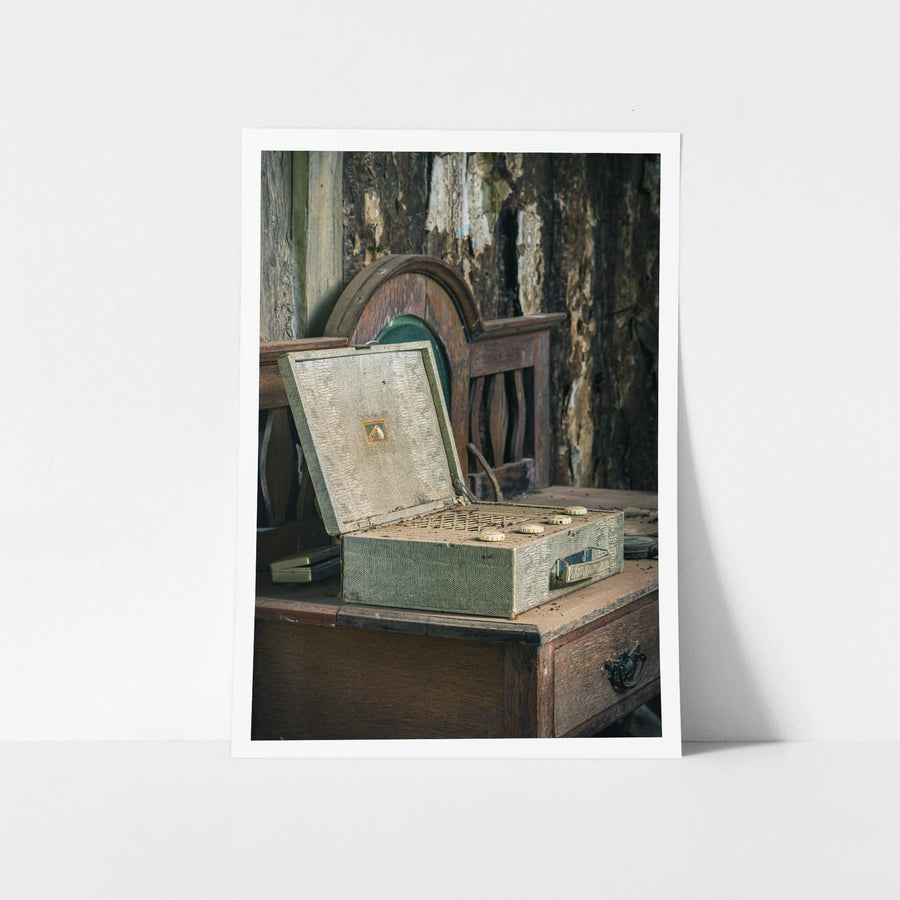 Wireless at Leichhardt House, a portable valve radio sits open on a dark timber dresser.