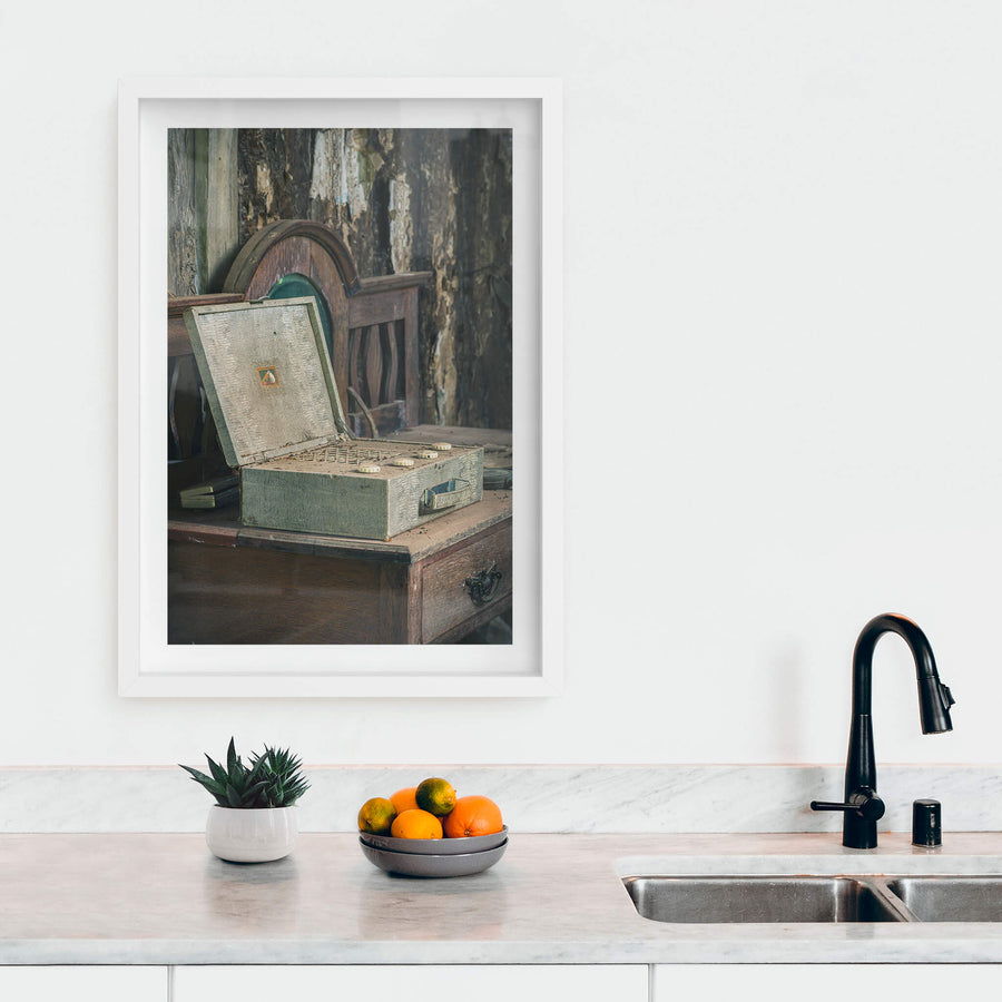 Wireless at Leichhardt House, a portable valve radio sits open on a dark timber dresser.