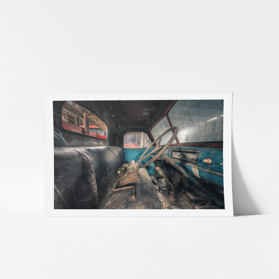 Take the Wheel at Mill Pond Farm, inside the cab of a mid-century truck, blue paint clings to the dashboard in uneven.