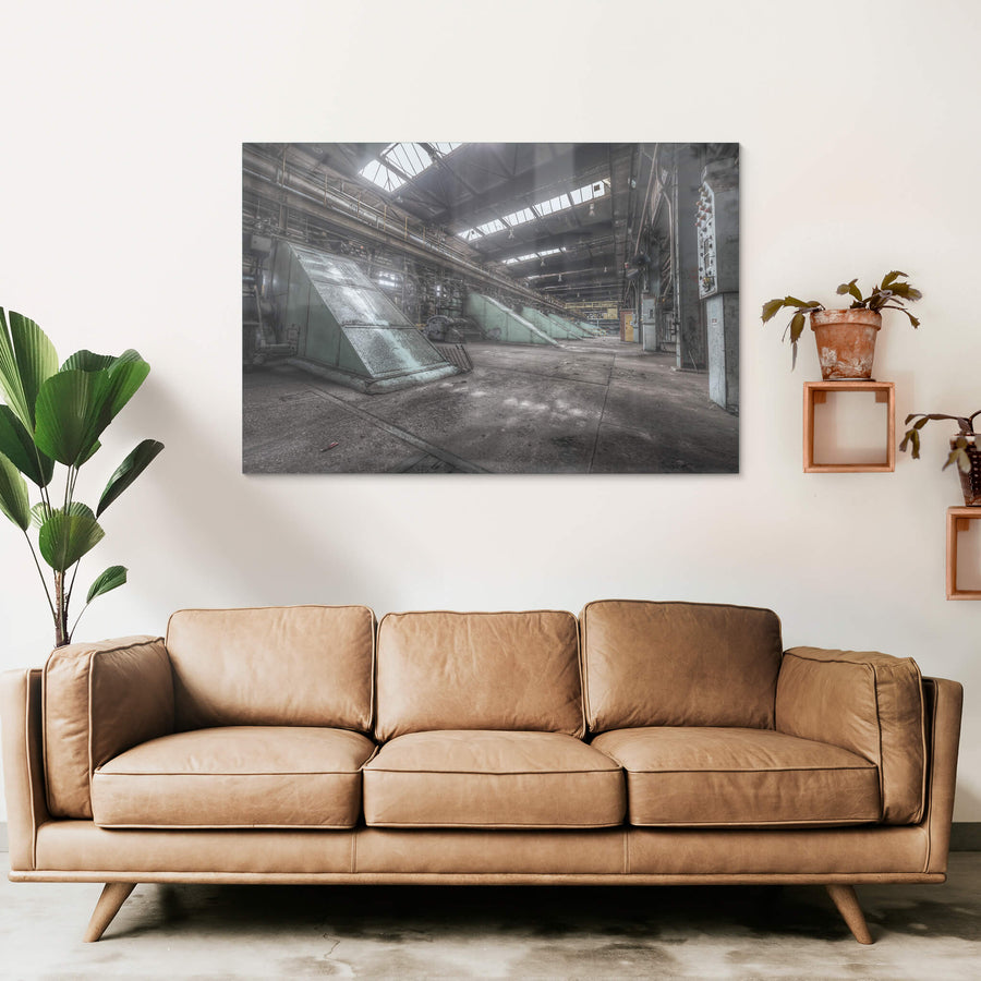 Main Press Floor at Morwell Power Station, large green steel housings sit at sharp angles along the concrete floor.