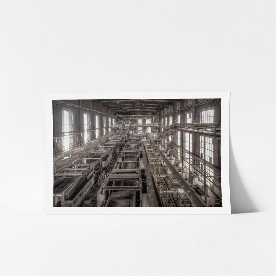 Wet Section at Morwell Power Station, rows of steel filtration trays stretch the full length of the hall, coated in fine.