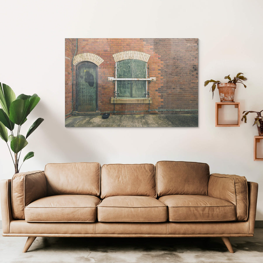 Magazine Hatch at Newington Armory, red brick facade, two arched openings side by side.