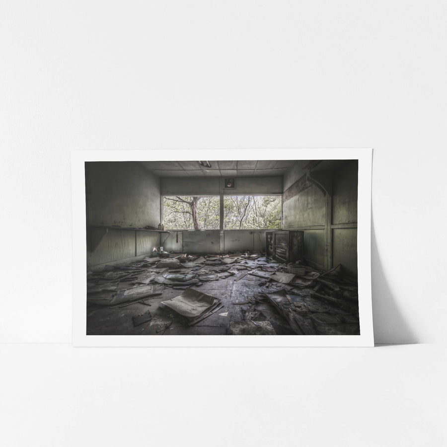 Storeroom at Nichitsu Mining Village, papers and folders cover every centimetre of the floor.