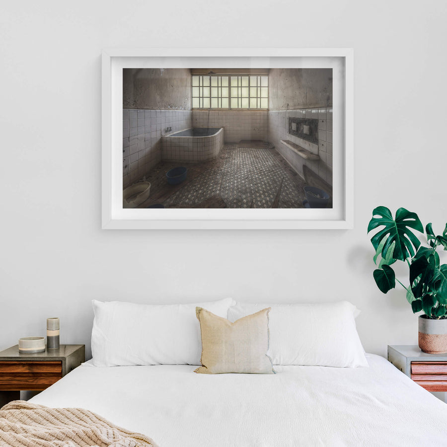 Yokusou at Nichitsu Mining Village, a small bathhouse room, tiled floor to ceiling in white square ceramic.