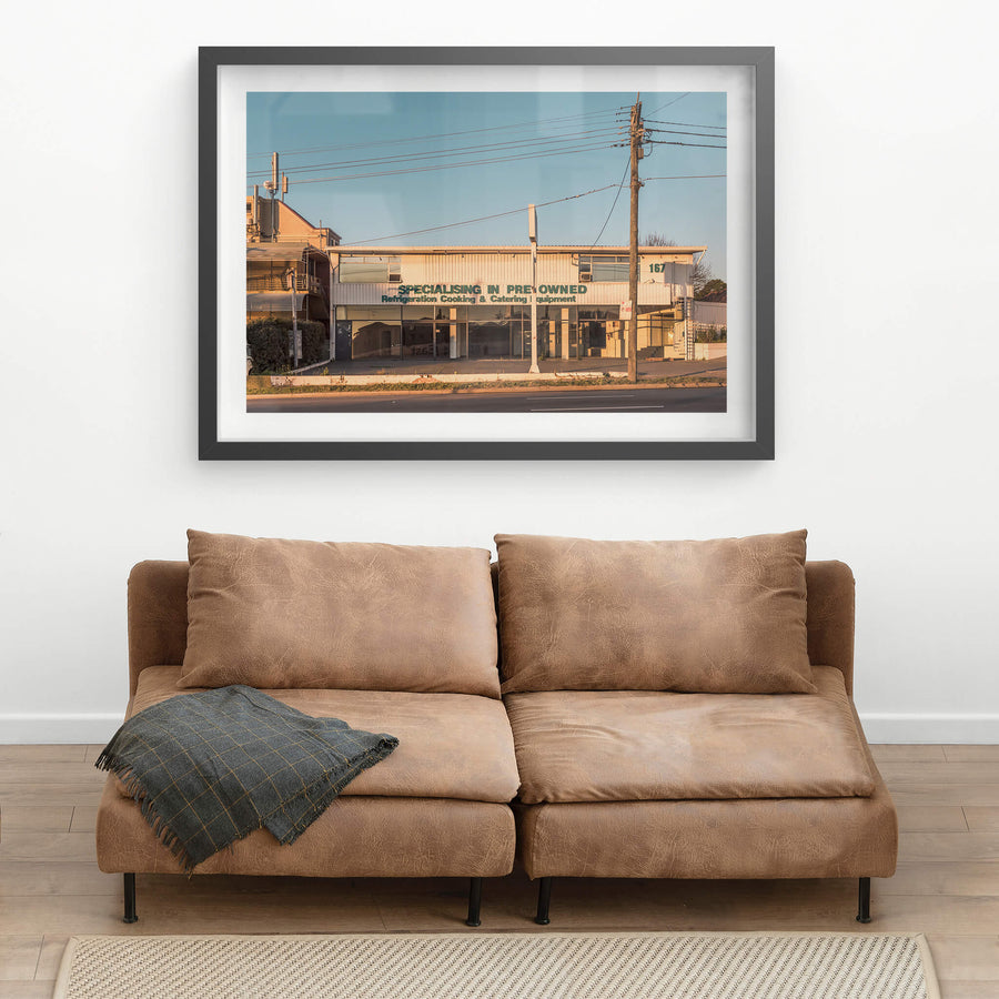 167 at Parramatta Road, a two-storey commercial building sits hard against Parramatta Road.