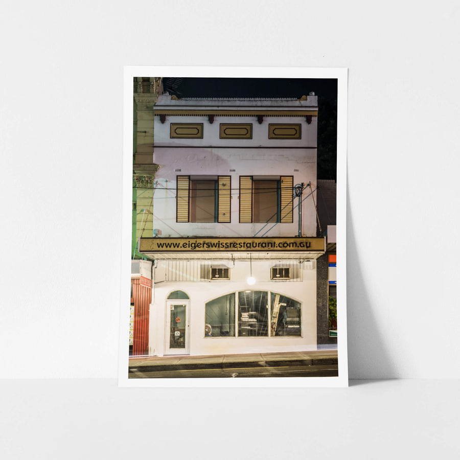 Eiger Swiss Restaurant at Parramatta Road, a two-storey Victorian-era shopfront sits flush with the footpath on Parramatta.