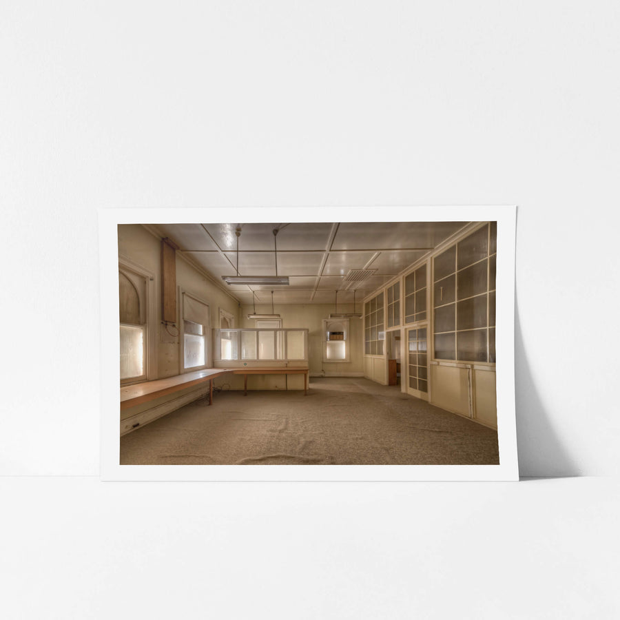 Drawing Office at Portland Cement Works, a long timber bench runs the length of the left wall, its surface bare.