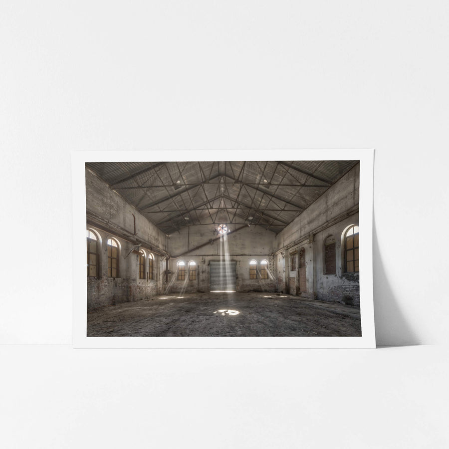 Power House Northern Interior at Portland Cement Works, a single beam of light falls from a roof ventilator and strikes.