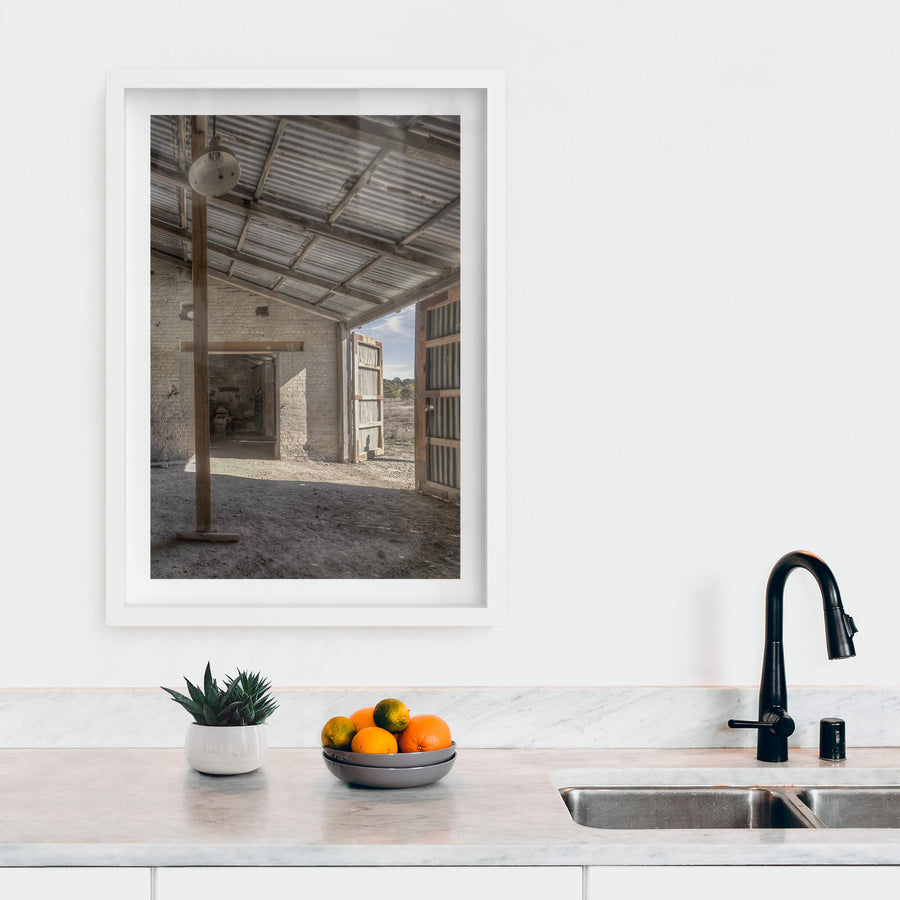 Raffan Mill Workshop at Portland Cement Works, a corrugated iron roof spans the workshop on rough-hewn timber beams.