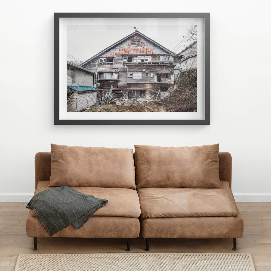 Side Facade at Streetscapes of Yubari, a shot from the side if an unstable building which would have once been a busy.
