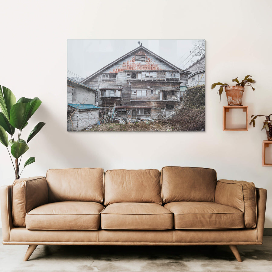 Side Facade at Streetscapes of Yubari, a shot from the side if an unstable building which would have once been a busy.