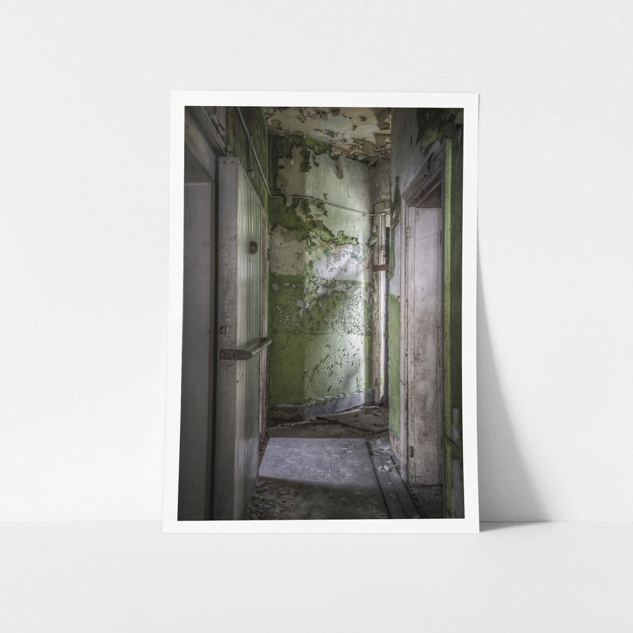 Cold Storage at Terminus Hotel, light cuts across the floor in a quiet diagonal, illuminating years of dust and decay.