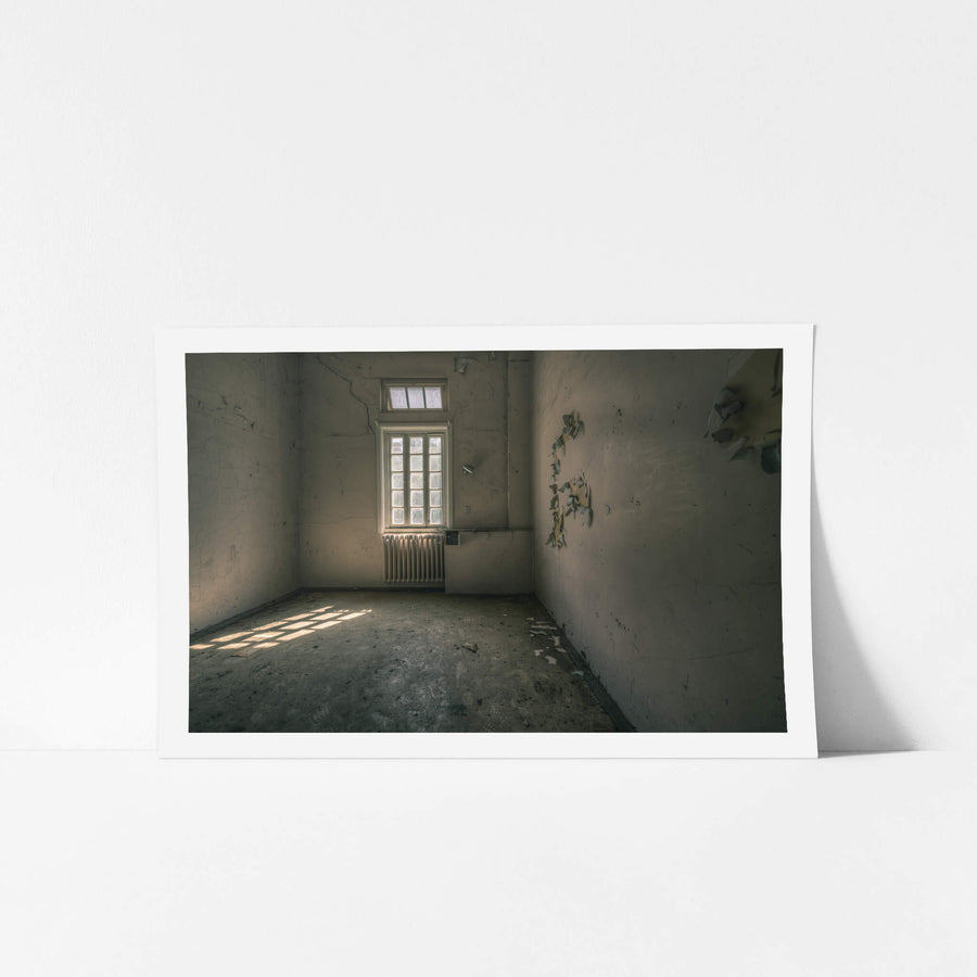 Confinement at The Asylum, a bare room.