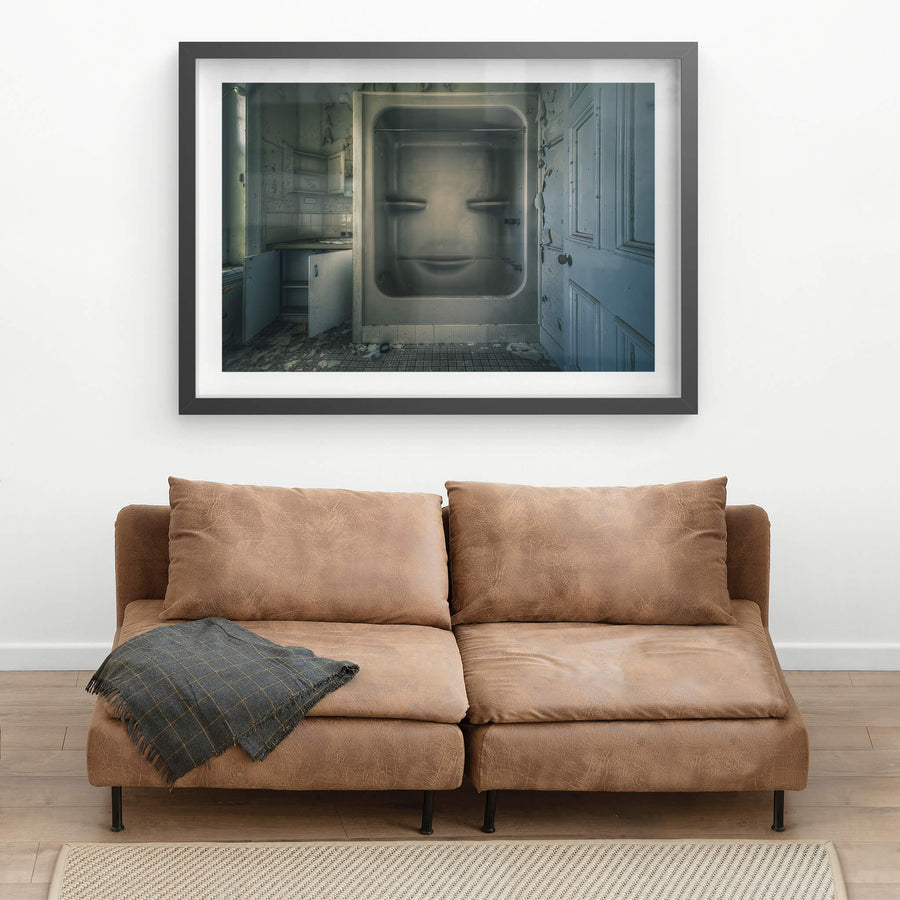 Face at The Asylum, a moulded fibreglass bath-shower unit sits recessed into the wall of a small washroom.