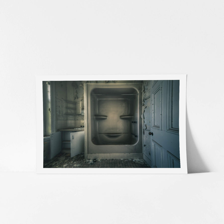 Face at The Asylum, a moulded fibreglass bath-shower unit sits recessed into the wall of a small washroom.