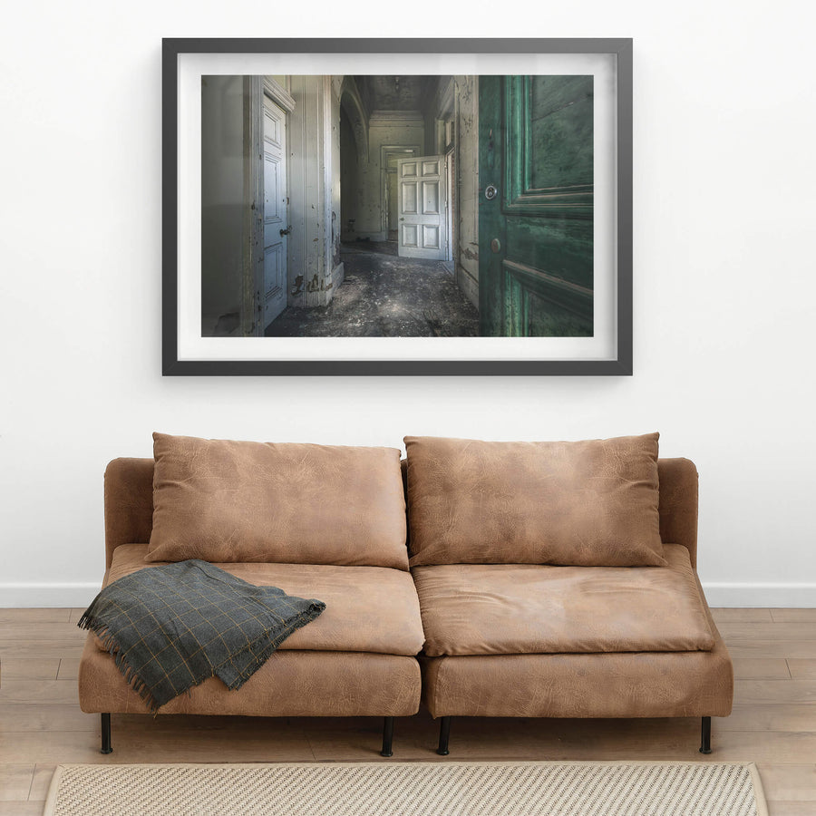 Rough Patch at The Asylum, a deep green door stands open at the entrance to a corridor.